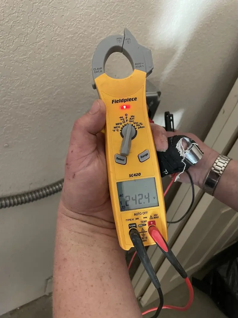 Voltage testing with clamp meter during Circuit Breaker Repair in Upper Allen